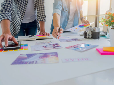 Designer discussing branding ideas in office