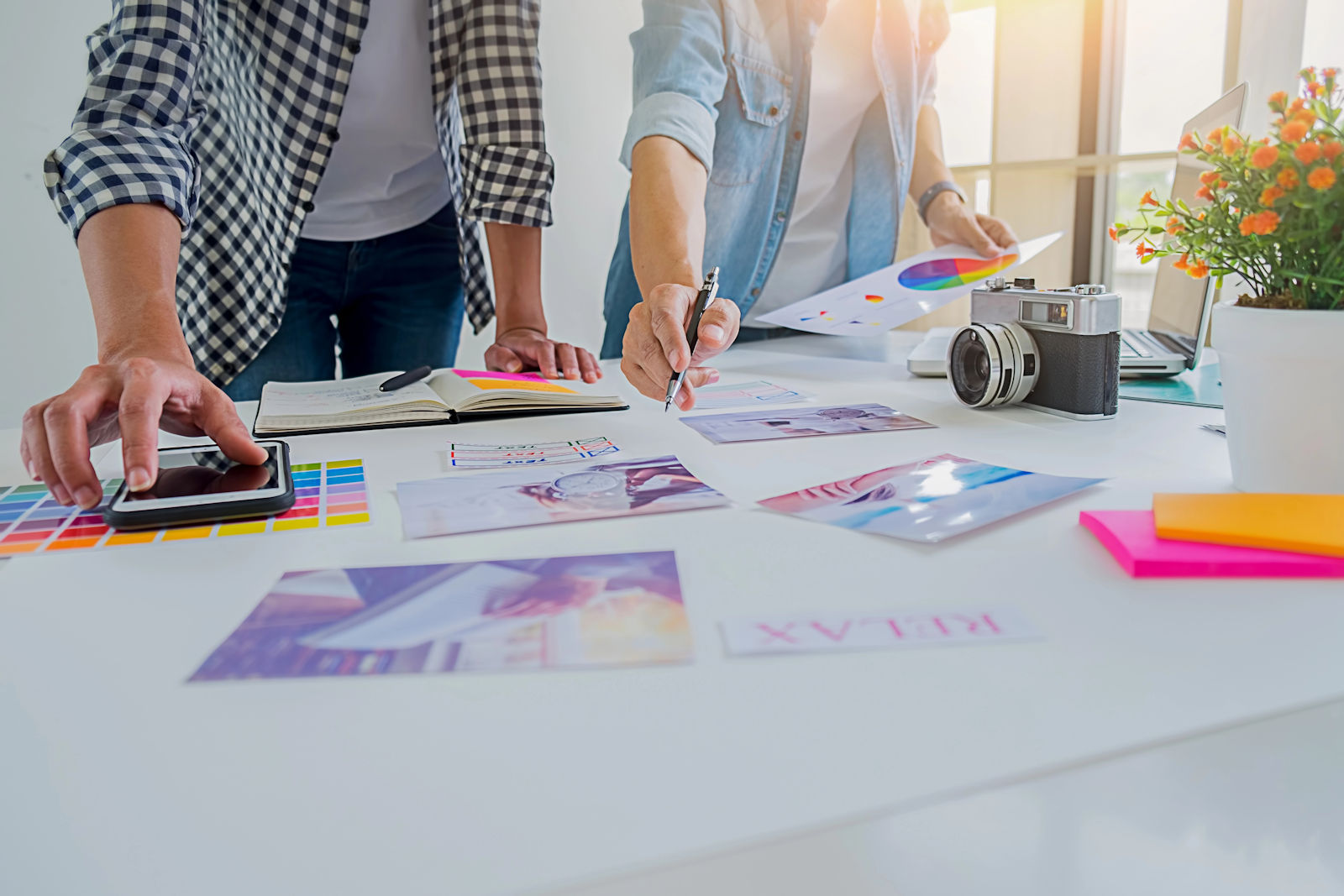 Designer discussing branding ideas in office