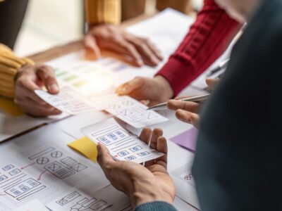 Group of ux developer and ux designer brainstorming about design
