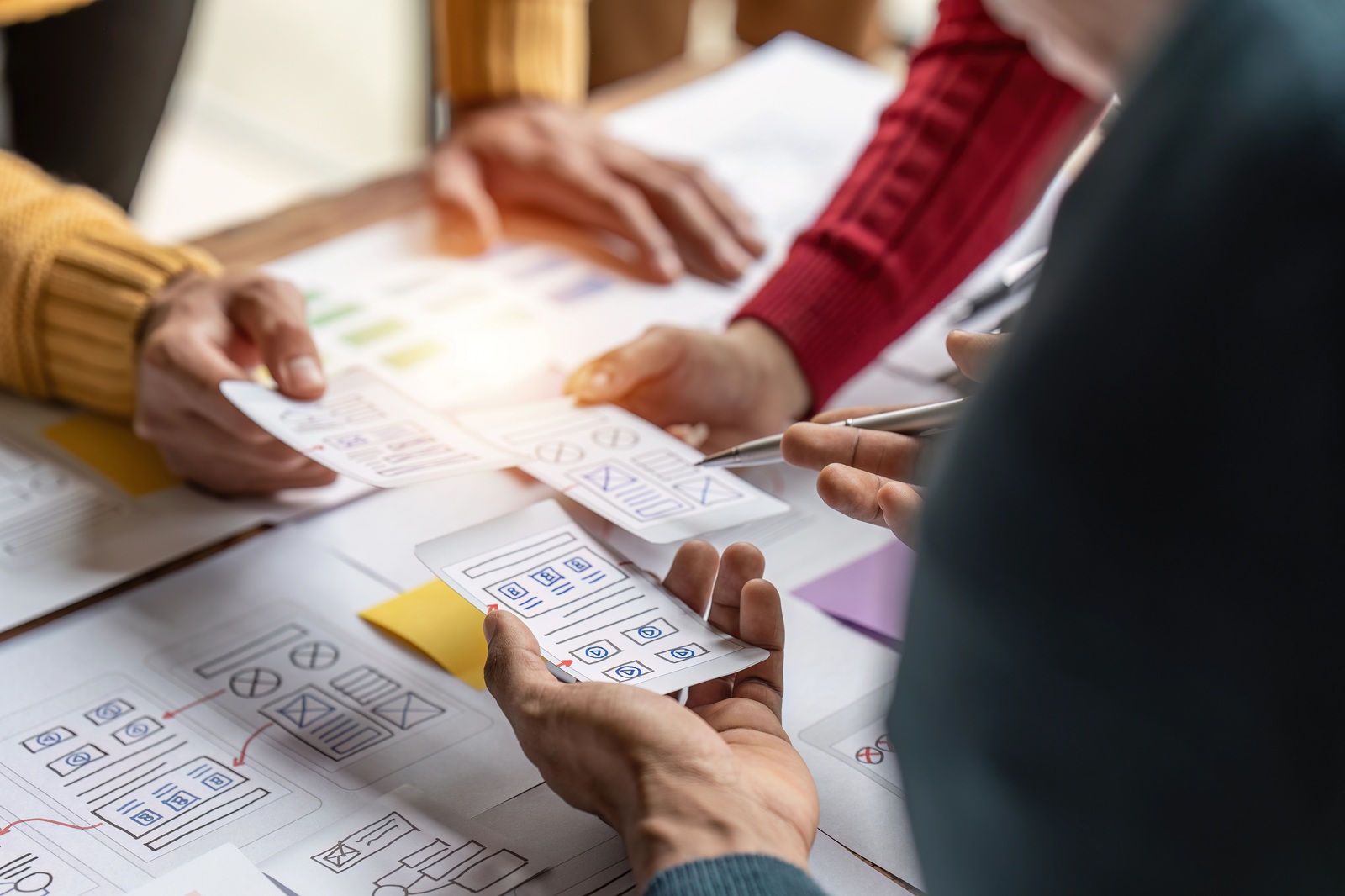 Group of ux developer and ux designer brainstorming about design
