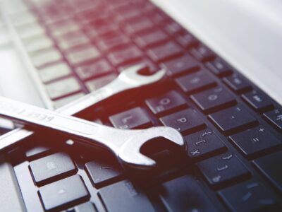 Wrenches on a computer keyboard